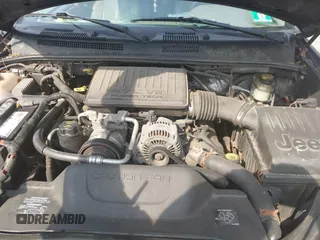 2004 Jeep Grand Cherokee Laredo with VIN 1J4GW48NX4C405558, listed as a IAAI auction lot 42440639 with 197,457 mi miles and . Bid and sale history available at DreamBid. Image 10.
