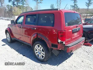 2010 Dodge Nitro SE with VIN 1D4PT2GK7AW142856, listed as a IAAI auction lot 41855687 with 197,248 mi miles. Bid and sale history available at carsss.com. Image 3.