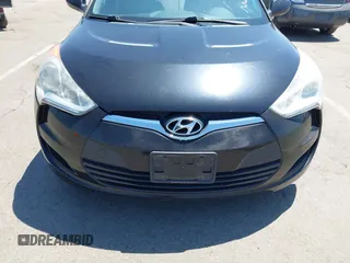 2013 Hyundai Veloster w/Black Int with VIN KMHTC6AD2DU144376, listed as a IAAI auction lot 42720882 with 143,023 mi miles and . Bid and sale history available at DreamBid. Image 6.