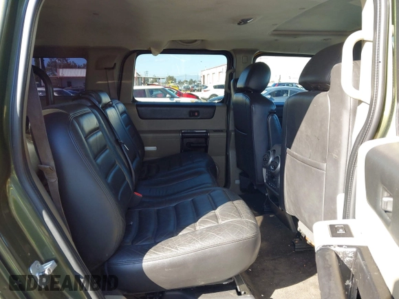 2003 Hummer H2 z VIN 5GRGN23UX3H124727, wystawiony jako IAAI lot #41697787 z przebiegiem 241 554 mil mil oraz . Historia ofert i sprzedaży dostępna na DreamBid. Obrazek 8.