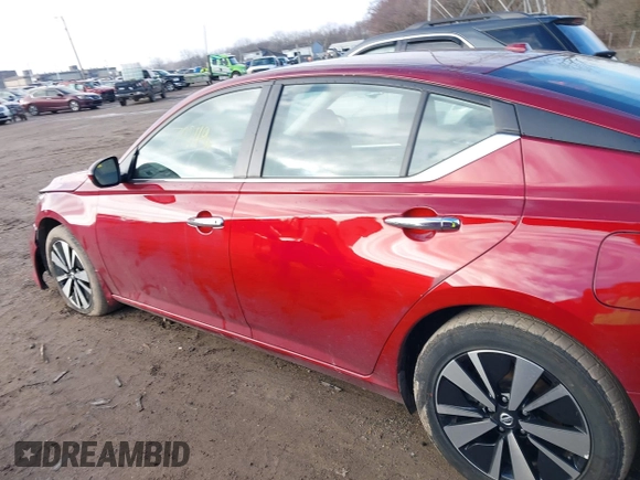 2022 Nissan Altima SV with VIN 1N4BL4DW5NN391359, listed as a IAAI auction lot 41203130 with 74,049 mi miles and . Bid and sale history available at DreamBid. Image 14.