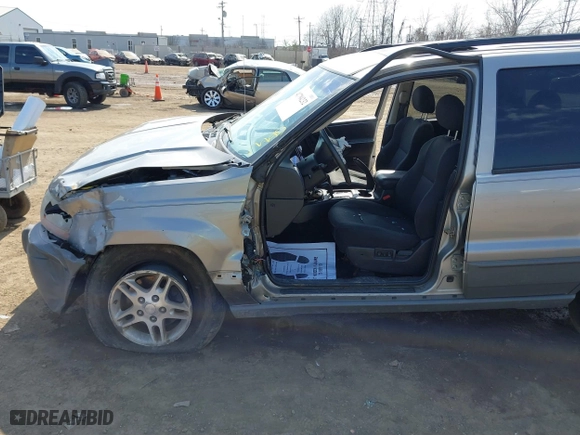 2002 Jeep Grand Cherokee Laredo with VIN 1J4GW48N42C188117, listed as a IAAI auction lot 41794232 with 1 mi miles. Bid and sale history available at carsss.com. Image 17.