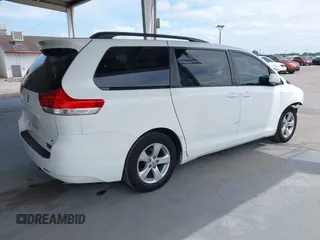 2014 Toyota Sienna LE AAS with VIN 5TDKK3DC2ES513425, listed as a IAAI auction lot 42107820 with 367,844 mi miles and . Bid and sale history available at carsss.com. Image 4.