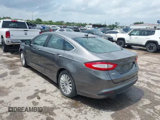 2013 Ford Fusion SE Hybrid with VIN 3FA6P0LU9DR247484, listed as a IAAI auction lot 42110685 with 202,531 mi miles. Bid and sale history available at carsss.com. Image 3.