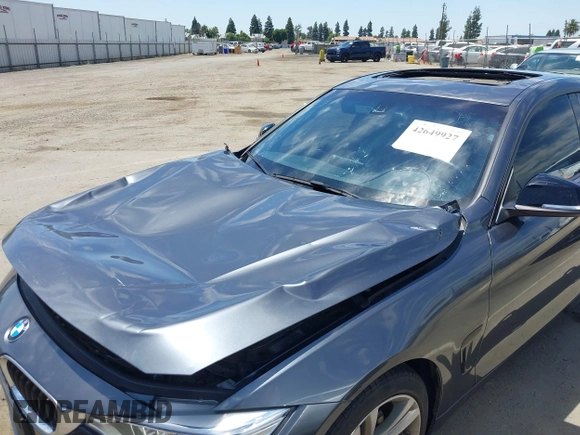 2015 BMW 4 Series 428i with VIN WBA4A5C59FG052596, listed as a IAAI auction lot 42649927 with 68,842 mi miles and . Bid and sale history available at DreamBid. Image 6.
