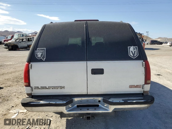 1998 GMC Suburban z VIN 1GKEC16R0WJ712847, wystawiony jako Copart lot #68557804 z przebiegiem 262 538 mil mil oraz Szkoda całkowita • Salvage title. Historia ofert i sprzedaży dostępna na DreamBid. Obrazek 6.