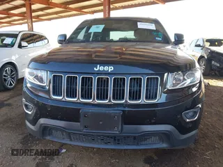 2014 Jeep Grand Cherokee Laredo with VIN 1C4RJEAG3EC472714, listed as a IAAI auction lot 40980100 with 124,603 mi miles. Bid and sale history available at carsss.com. Image 13.