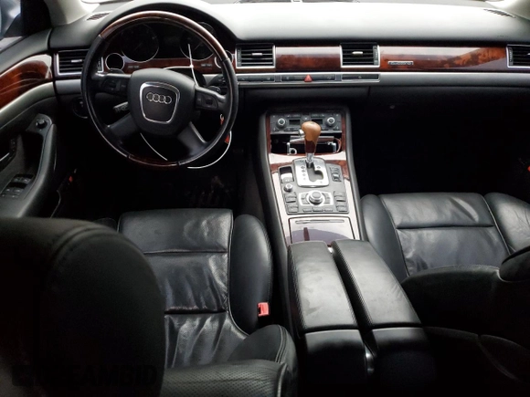 2006 Audi A8 4.2L z VIN WAULL44E86N017283, wystawiony jako Copart lot #43999865 z przebiegiem Nie podano mil oraz Szkoda całkowita • Salvage title. Historia ofert i sprzedaży dostępna na DreamBid. Obrazek 8.