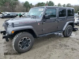 2016 Jeep Wrangler Unlimited Rubicon with VIN 1C4BJWFG1GL205588, listed as a Copart auction lot 50335065 with 58,148 mi miles and Salvage title. Bid and sale history available at DreamBid. Image 1.