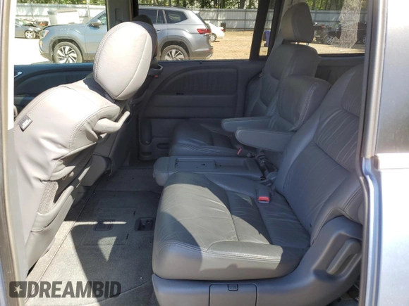 2005 Honda Odyssey EX-L z VIN 5FNRL386X5B034514, wystawiony jako Copart lot #52702435 z przebiegiem 65 988 mil mil oraz Szkoda całkowita • Salvage title. Historia ofert i sprzedaży dostępna na DreamBid. Obrazek 11.