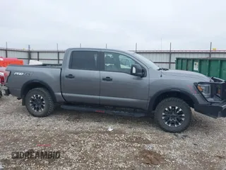 2021 Nissan Titan Pro-4X with VIN 1N6AA1ED3MN531332, listed as a IAAI auction lot 41918065 with 125,323 mi miles and . Bid and sale history available at DreamBid. Image 13.