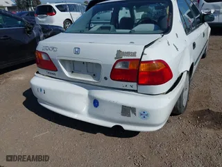 2000 Honda Civic LX with VIN 2HGEJ6673YH502410, listed as a IAAI auction lot 41992745 with 173,958 mi miles. Bid and sale history available at carsss.com. Image 6.