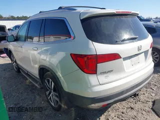 2016 Honda Pilot Elite with VIN 5FNYF6H05GB019292, listed as a IAAI auction lot 41668830 with 170,718 mi miles. Bid and sale history available at carsss.com. Image 3.