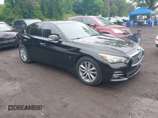 2014 Infiniti Q50 Premium z VIN JN1BV7AR4EM695232, wystawiony jako IAAI lot #42367581 z przebiegiem 138 063 mil mil oraz . Historia ofert i sprzedaży dostępna na DreamBid. Obrazek 1.