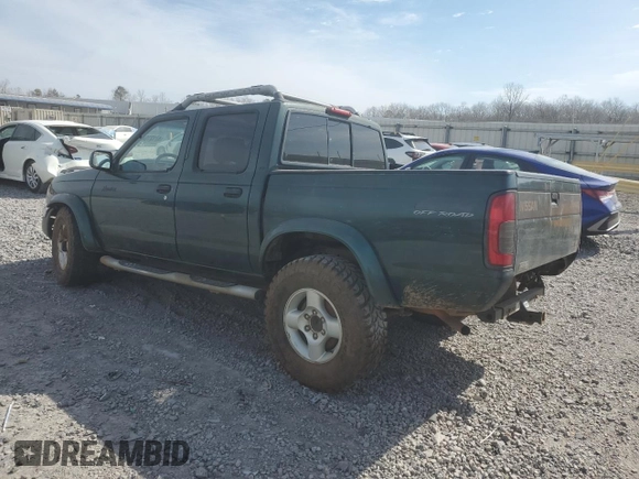 2000 Nissan Frontier XE with VIN 1N6ED27Y4YC382199, listed as a Copart auction lot 47127045 with 207,449 mi miles and Salvage title. Bid and sale history available at DreamBid. Image 2.