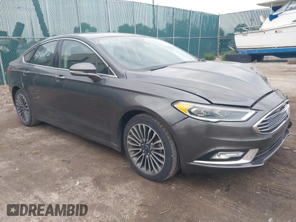 2017 Ford Fusion Titanium with VIN 3FA6P0K96HR208757, listed as a IAAI auction lot 42400172 with 90,000 mi miles and . Bid and sale history available at DreamBid. Image 1.