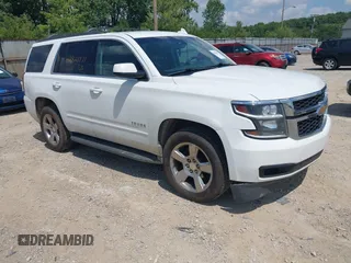 2017 Chevrolet Tahoe LS z VIN 1GNSKAKCXHR267368, wystawiony jako IAAI lot #42826171 z przebiegiem 262 362 mil mil oraz . Historia ofert i sprzedaży dostępna na DreamBid. Obrazek 1.