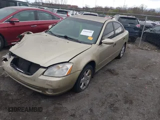 2002 Nissan Altima S with VIN 1N4AL11DX2C156685, listed as a IAAI auction lot 41821949 with 197,511 mi miles. Bid and sale history available at carsss.com. Image 2.