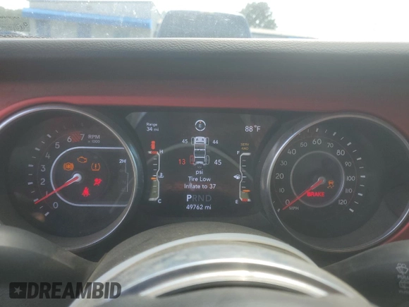 2021 Jeep Wrangler Unlimited Rubicon z VIN 1C4HJXFN8MW547855, wystawiony jako Copart lot #55619075 z przebiegiem 49 762 mil mil oraz Szkoda całkowita • Salvage title. Historia ofert i sprzedaży dostępna na DreamBid. Obrazek 9.