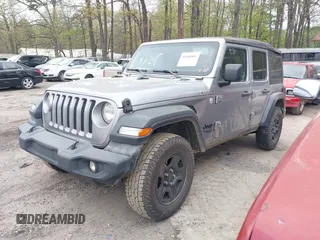 2021 Jeep Wrangler Unlimited Sport S with VIN 1C4HJXDN3MW717266, listed as a IAAI auction lot 41940869 with 113,386 mi miles. Bid and sale history available at carsss.com. Image 17.