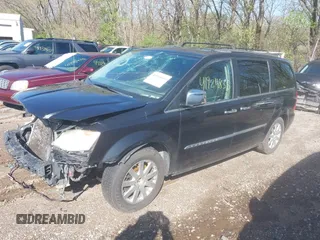 2012 Chrysler Town & Country Touring L with VIN 2C4RC1CG4CR163287, listed as a IAAI auction lot 41924835 with 211,461 mi miles and . Bid and sale history available at carsss.com. Image 2.