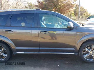 2014 Dodge Journey Crossroad z VIN 3C4PDDGG9ET302345, wystawiony jako IAAI lot #41888259 z przebiegiem 104 980 mil mil oraz . Historia ofert i sprzedaży dostępna na DreamBid. Obrazek 13.