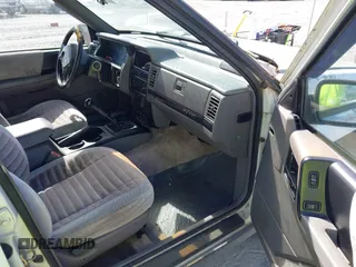 1994 Jeep Grand Cherokee Laredo with VIN 1J4GZ58S6RC295621, listed as a IAAI auction lot 42751869 with 370,230 mi miles and . Bid and sale history available at DreamBid. Image 5.