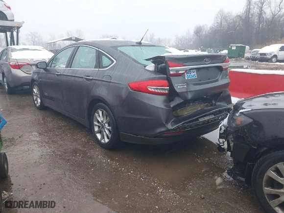 2017 Ford Fusion Energi SE with VIN 3FA6P0PU6HR203037, listed as a IAAI auction lot 41567334 with 96,852 mi miles. Bid and sale history available at carsss.com. Image 3.