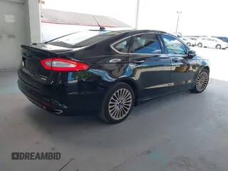 2016 Ford Fusion Titanium with VIN 3FA6P0K99GR235692, listed as a IAAI auction lot 42587743 with 169,467 mi miles and . Bid and sale history available at DreamBid. Image 4.