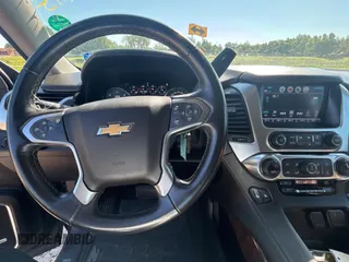 2017 Chevrolet Suburban LT with VIN 1GNSKHKC7HR377710, listed as a Copart auction lot 55876385 with 149,195 mi miles and Clean Title. Bid and sale history available at DreamBid. Image 9.