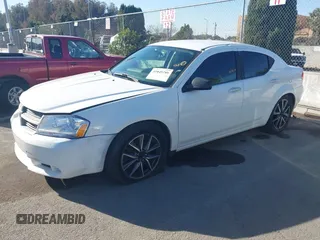2010 Dodge Avenger SXT with VIN 1B3CC4FB6AN108889, listed as a IAAI auction lot 41049789 with 127,405 mi miles. Bid and sale history available at carsss.com. Image 2.