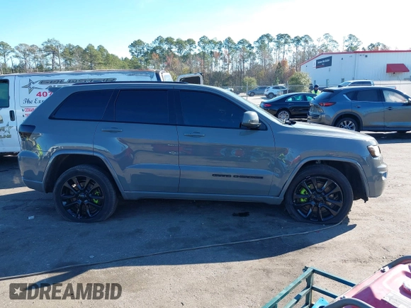 2021 Jeep Grand Cherokee Laredo E with VIN 1C4RJEAG3MC713511, listed as a IAAI auction lot 41235904 with 73,343 mi miles and . Bid and sale history available at DreamBid. Image 13.