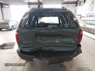 2003 Dodge Caravan SE with VIN 1D4GP24313B191319, listed as a IAAI auction lot 41398477 with 220,083 mi miles. Bid and sale history available at carsss.com. Image 16.