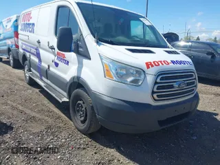 2015 Ford Transit Cargo with VIN 1FTNR1ZM1FKA46909, listed as a IAAI auction lot 42092389 with 216,806 mi miles. Bid and sale history available at carsss.com. Image 1.