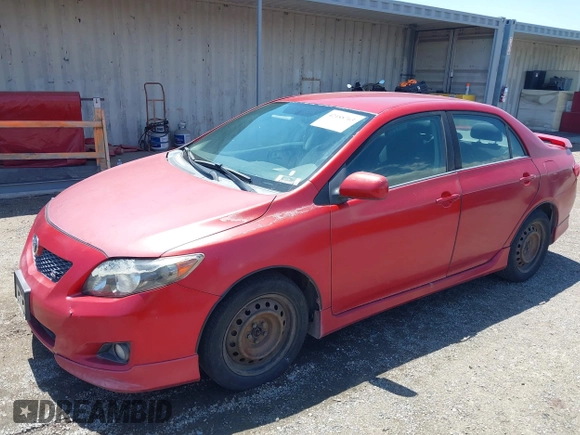 2009 Toyota Corolla with VIN 1NXBU40EX9Z077847, listed as a IAAI auction lot 42188763 with 180,324 mi miles. Bid and sale history available at carsss.com. Image 2.