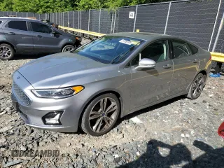 2020 Ford Fusion Titanium with VIN 3FA6P0D98LR138815, listed as a Copart auction lot 57550385 with 121,490 mi miles and Salvage title. Bid and sale history available at DreamBid. Image 1.