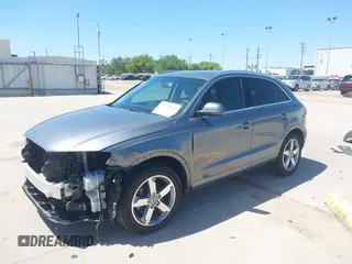 2015 Audi Q3 Prestige with VIN WA1GFCFS7FR013818, listed as a IAAI auction lot 41975076 with 60,295 mi miles and . Bid and sale history available at DreamBid. Image 2.