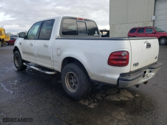 2002 Ford F-150 XLT with VIN 1FTRW07L12KA32310, listed as a Copart auction lot 44012485 with 200,586 mi miles and Salvage Title. Bid and sale history available at carsss.com. Image 2.