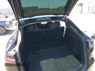 2024 Tesla Model Y with VIN 7SAYGDED2RF040745, listed as a IAAI auction lot 41986613 with 9,778 mi miles and . Bid and sale history available at DreamBid. Image 19.