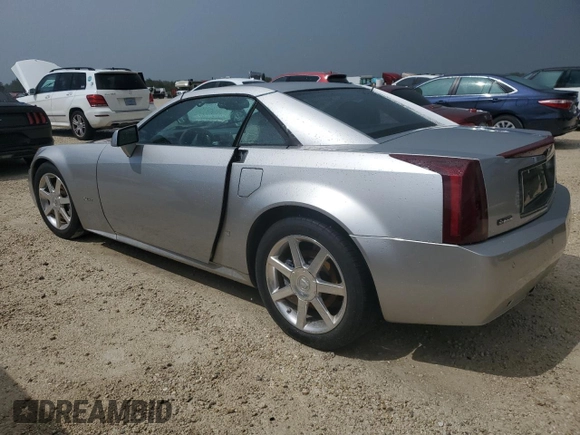 2006 Cadillac XLR z VIN 1G6YV36A365601441, wystawiony jako Copart lot #73945994 z przebiegiem Nie podano mil oraz Szkody całkowita. Historia ofert i sprzedaży dostępna na DreamBid. Obrazek 2.