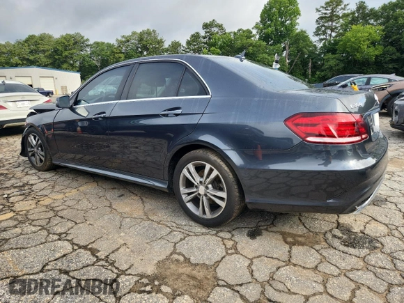 2014 Mercedes-Benz E 350 Sport with VIN WDDHF5KBXEA872156, listed as a Copart auction lot 60892695 with 166,555 mi miles and Salvage title. Bid and sale history available at DreamBid. Image 2.
