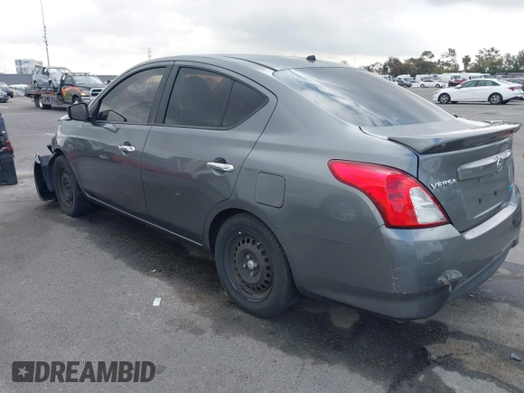 2016 Nissan Versa S Plus with VIN 3N1CN7APXGL857803, listed as a IAAI auction lot 42139436 with 187,251 mi miles. Bid and sale history available at carsss.com. Image 3.