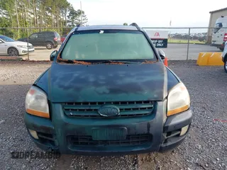 2006 Kia Sportage LX with VIN KNDJF723467183437, listed as a IAAI auction lot 42193429 with 186,114 mi miles and . Bid and sale history available at carsss.com. Image 6.