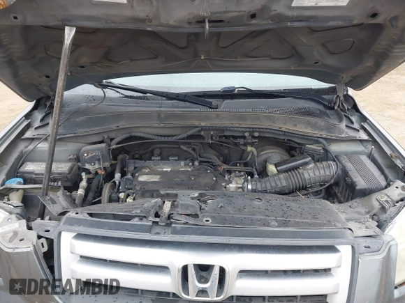 2007 Honda Pilot LX with VIN 5FNYF281X7B006877, listed as a IAAI auction lot 41595667 with 255,799 mi miles. Bid and sale history available at carsss.com. Image 10.