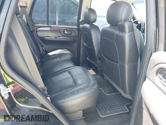 2006 GMC Envoy Denali with VIN 1GKES63M262344853, listed as a IAAI auction lot 42024960 with 183,066 mi miles. Bid and sale history available at carsss.com. Image 8.