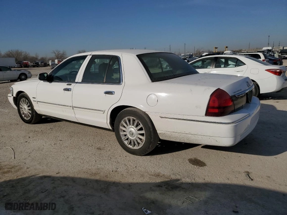 2010 Mercury Grand Marquis LS with VIN 2MEBM7FV7AX614134, listed as a Copart auction lot 48724825 with 129,960 mi miles and Salvage Title. Bid and sale history available at carsss.com. Image 2.