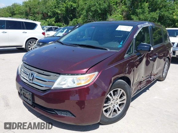 2011 Honda Odyssey EX-L with VIN 5FNRL5H60BB094647, listed as a IAAI auction lot 42223712 with 202,612 mi miles and . Bid and sale history available at carsss.com. Image 17.