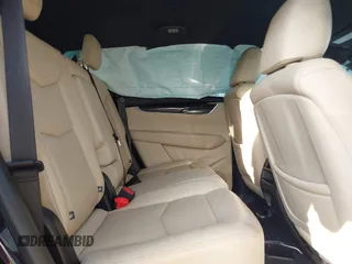 2018 Cadillac XT5 FWD with VIN 1GYKNARS6JZ179706, listed as a IAAI auction lot 41195570 with 80,676 mi miles. Bid and sale history available at carsss.com. Image 8.