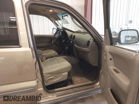 2005 Jeep Liberty Sport with VIN 1J4GL48K85W717487, listed as a IAAI auction lot 42082744 with 103,888 mi miles. Bid and sale history available at carsss.com. Image 5.