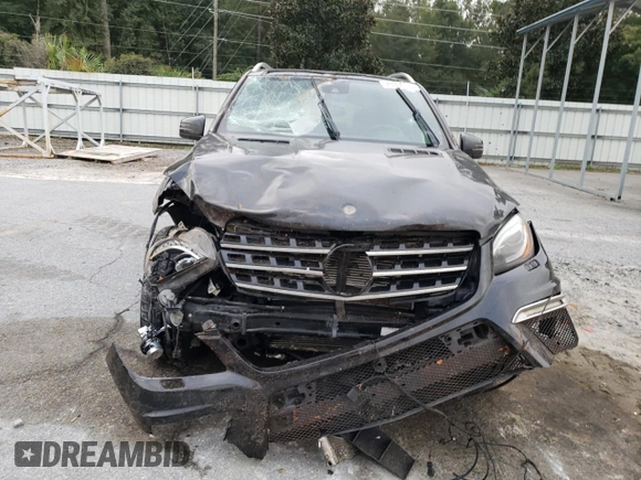 2015 Mercedes-Benz M 63 AMG with VIN 4JGDA7EB0FA440509, listed as a Copart auction lot 73954174 with 74,650 mi miles and Salvage Title. Bid and sale history available at carsss.com. Image 5.